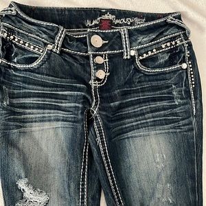 Almost famous jeans size 3, 30” long preowned, but in very good condition.
